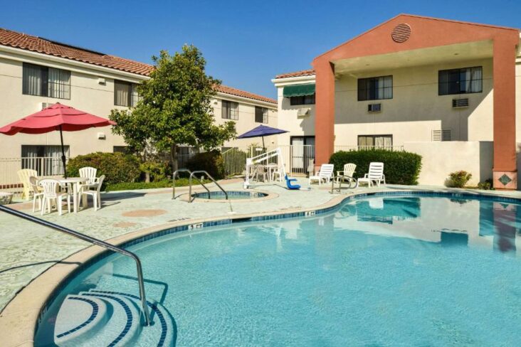 A view of the outdoor swimming pool at the Quality Inn & Suites Walnut - City of Industry.