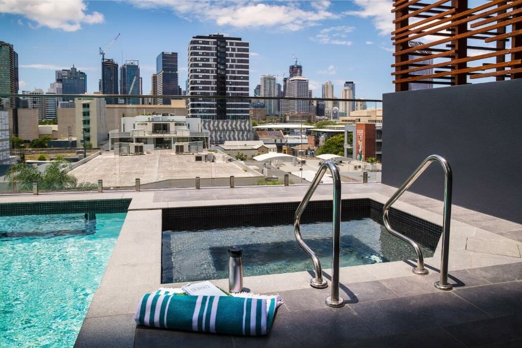 The rooftop swimming pool and jacuzzi at the Ivy and Eve Apartments.