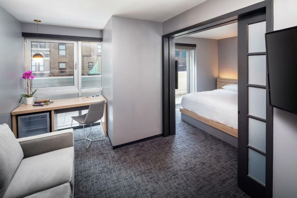 A one-bedroom suite at the Henn na Hotel New York.