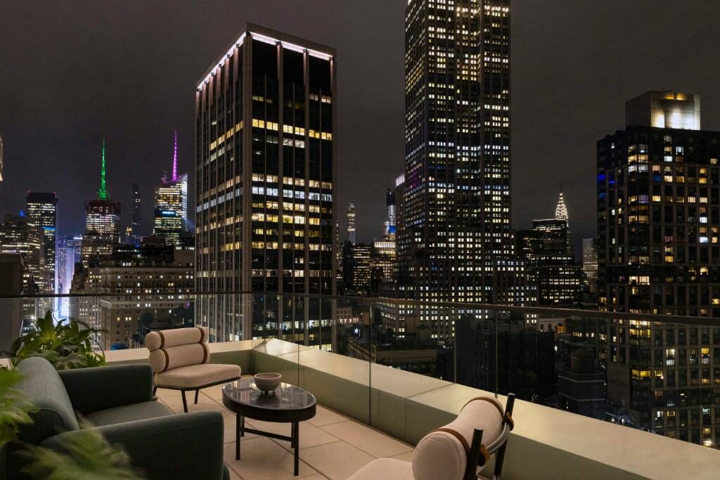 On a balcony at the Virgin Hotels New York City.