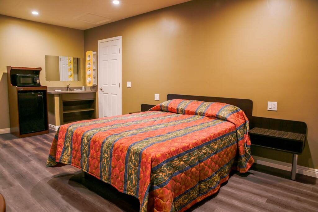 A room with a refrigerator at the Newport Bay Inn.