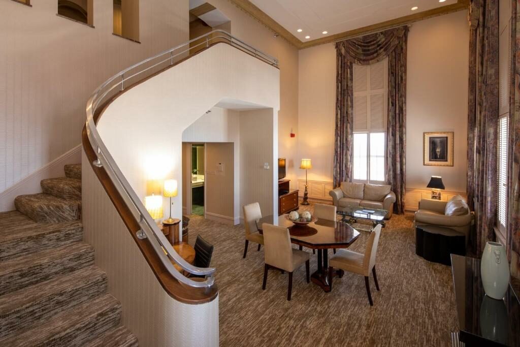 A bi-level king suite at the Hilton Cincinnati Netherland Plaza