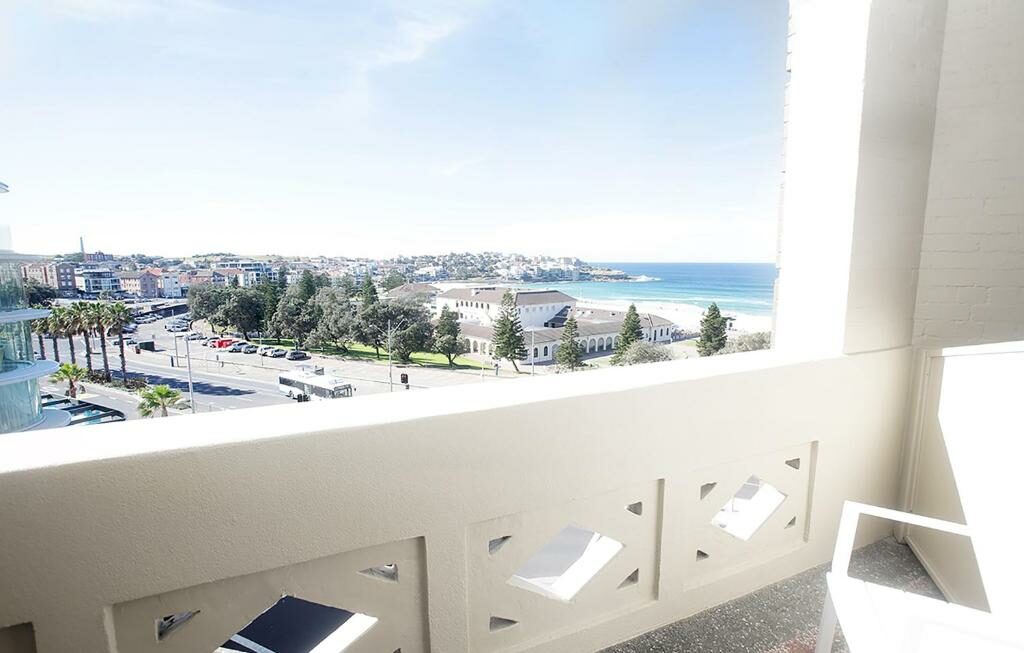 On a balcony at the Hotel Bondi.